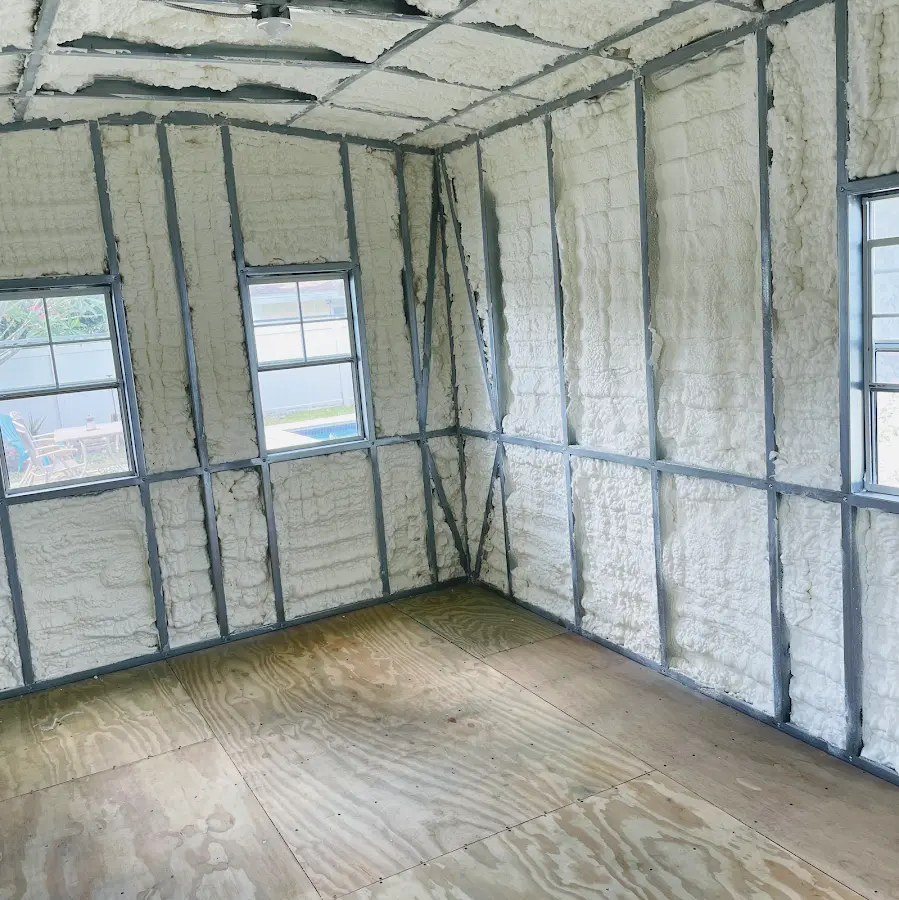 Closed-cell spray foam insulation applied to wall cavities in a residential project in Collierville