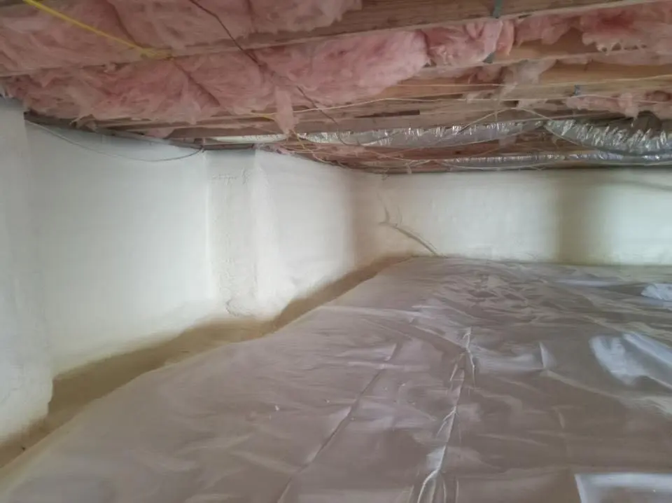 Crawl space encapsulation with closed-cell spray foam for Commercial Roof Restoration in Collierville